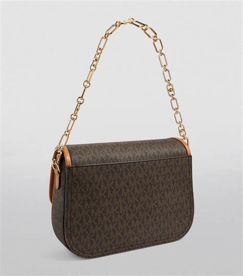 michael michael kors star studded medium messenger bag|Michael Kors small Messenger bag.